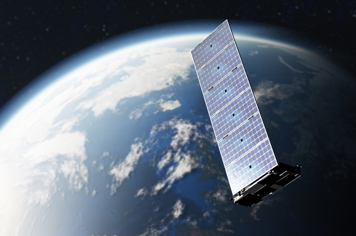 satelita Starlink firmy SpaceX na tle Ziemi